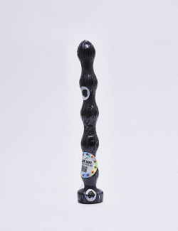 XL Dildo from All Black in 32cm compared to a mug